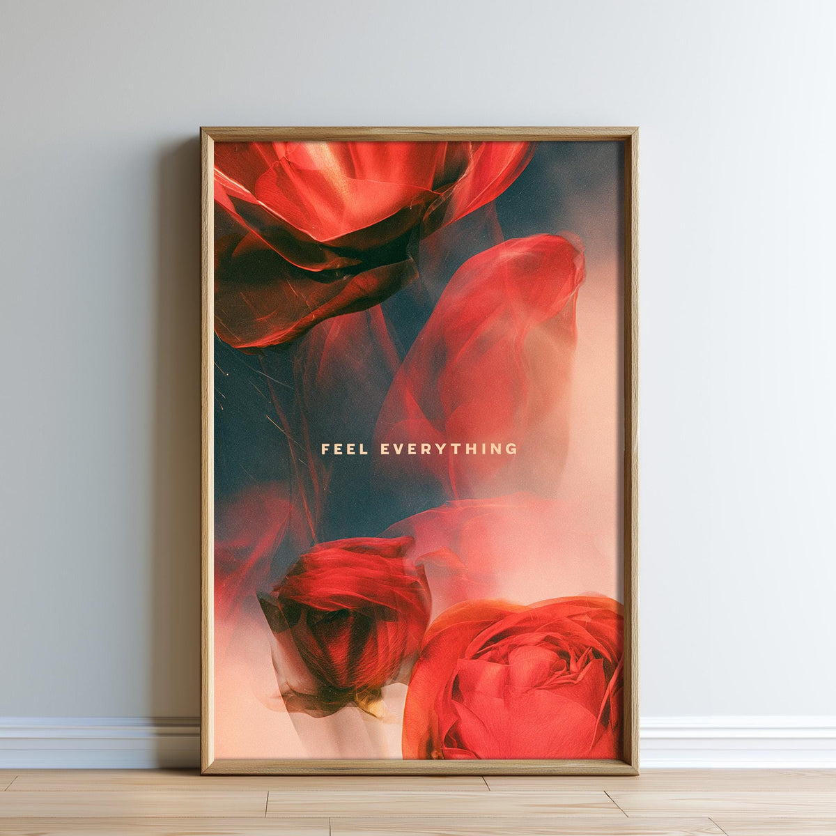 The image is a framed poster with a vibrant red rose design and the text "Feel Everything" displayed prominently.