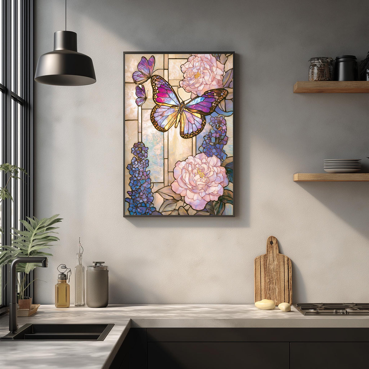 a kitchen counter with a framed stained glass artwork depicting colorful butterflies and flowers hanging on the wall above it.
