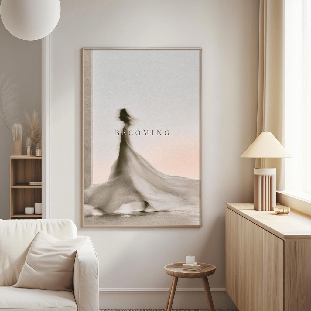 a living room with a large framed poster of a woman in a flowing dress hanging on the wall.