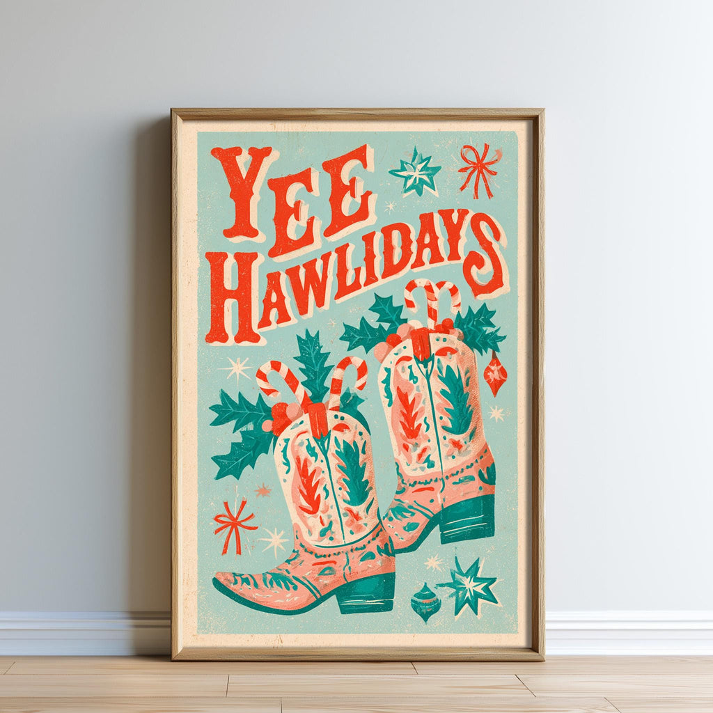 A framed poster with a festive design featuring a pair of colorful cowboy boots, candy canes, and Christmas decorations.