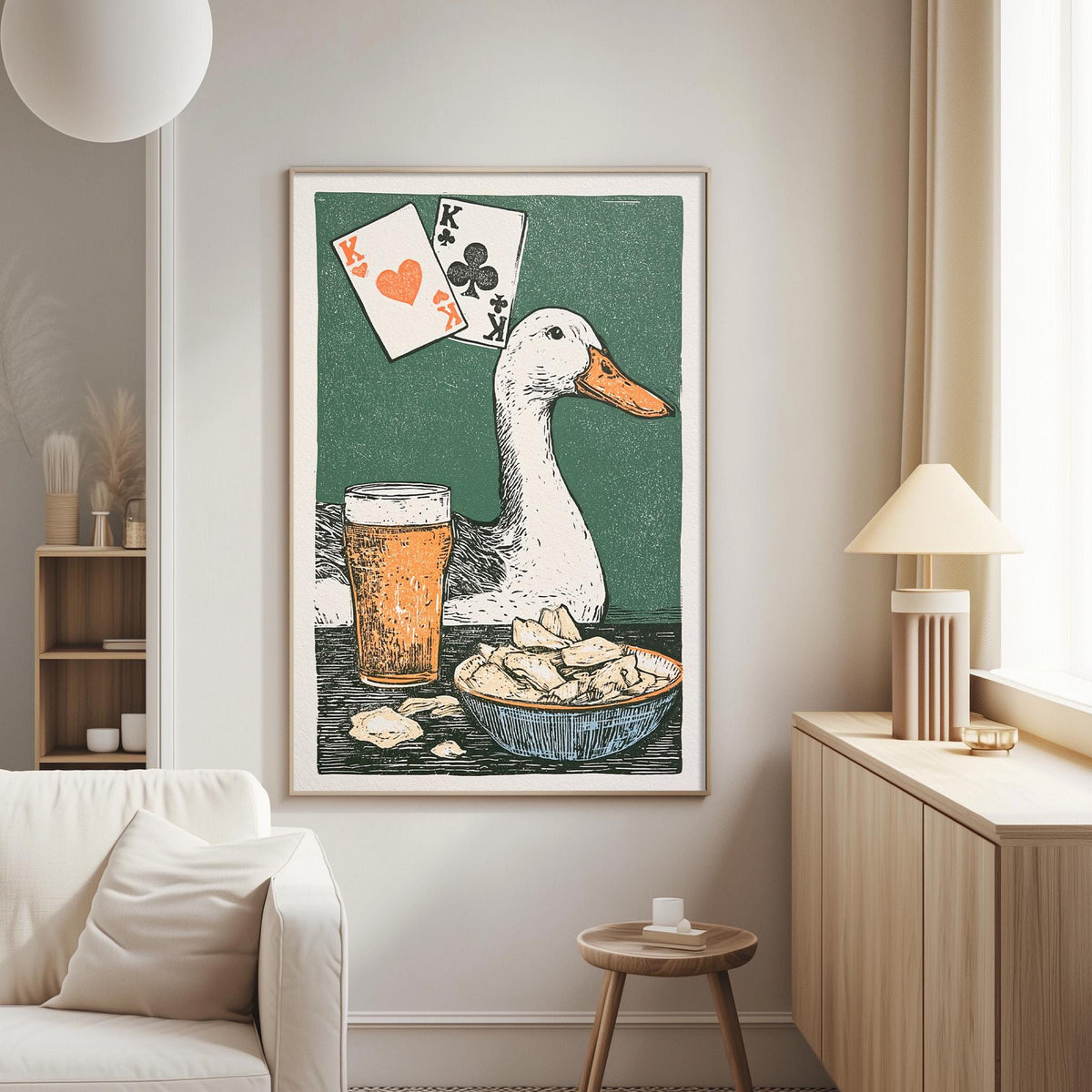 a large framed illustration of a duck with playing cards and a beer glass on a table, set against a green background.