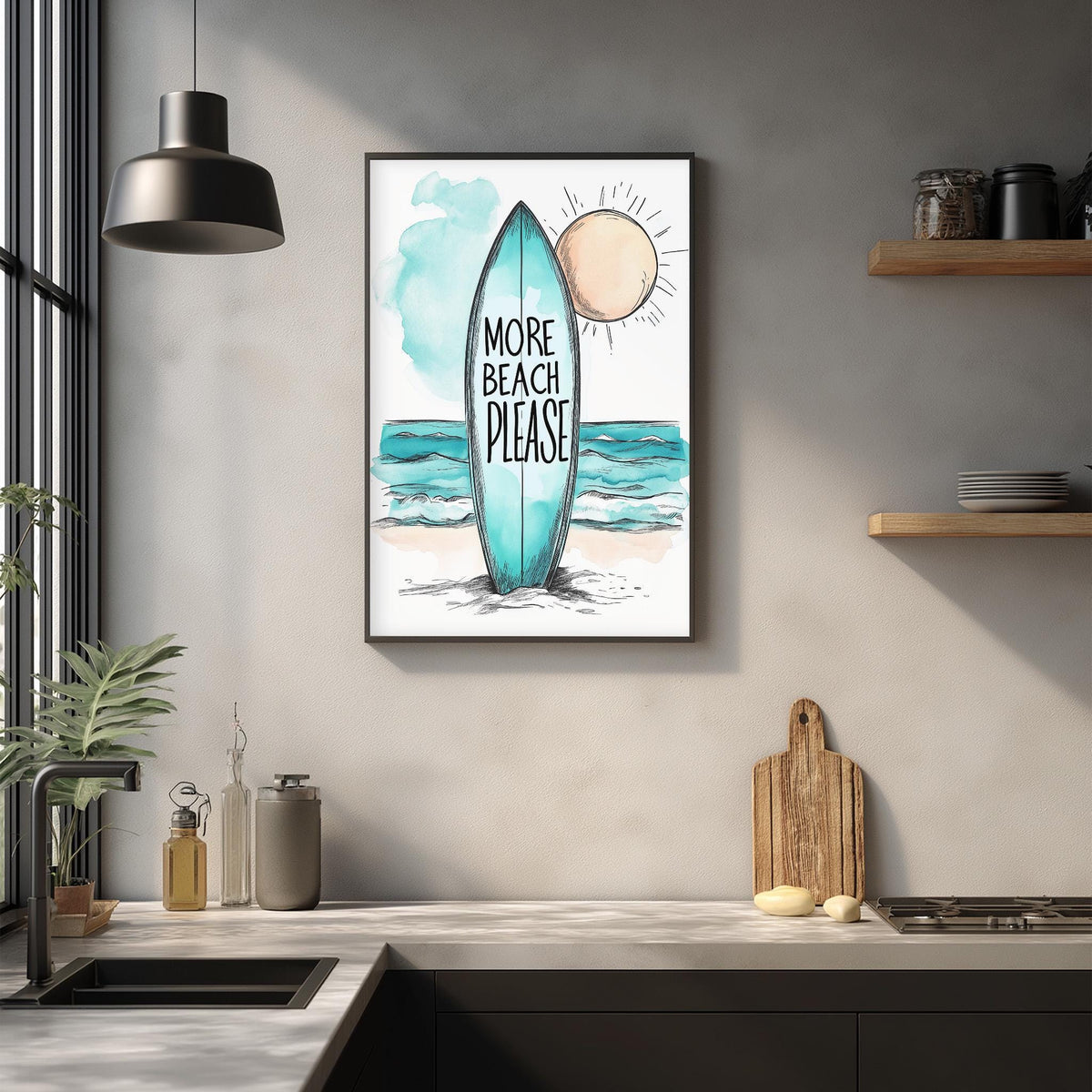 a framed poster with a beach scene and the text "MORE BEACH PLEASE" hanging on a wall above a kitchen counter.
