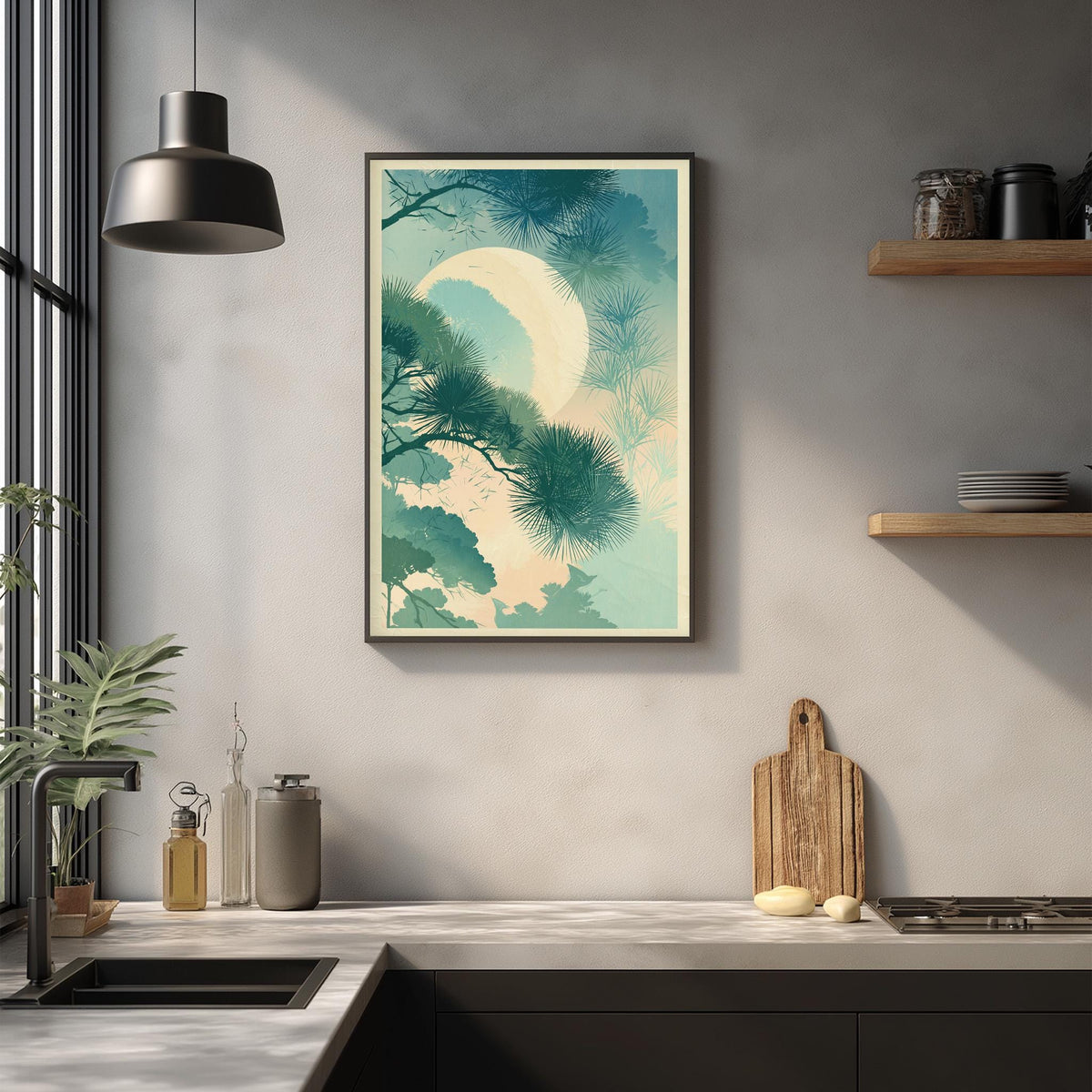 a kitchen counter with a framed painting of a moonlit forest scene hanging above it. The painting has a blue and green color scheme, depicting a serene night landscape with a crescent moon and pine trees. The kitchen counter has various items on it, including a cutting board, a bottle, and a vase. The overall scene is minimalist and modern, with a focus on the natural elements of the painting.