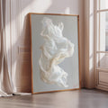 a large, framed artwork depicting a flowing, white fabric or cloth.