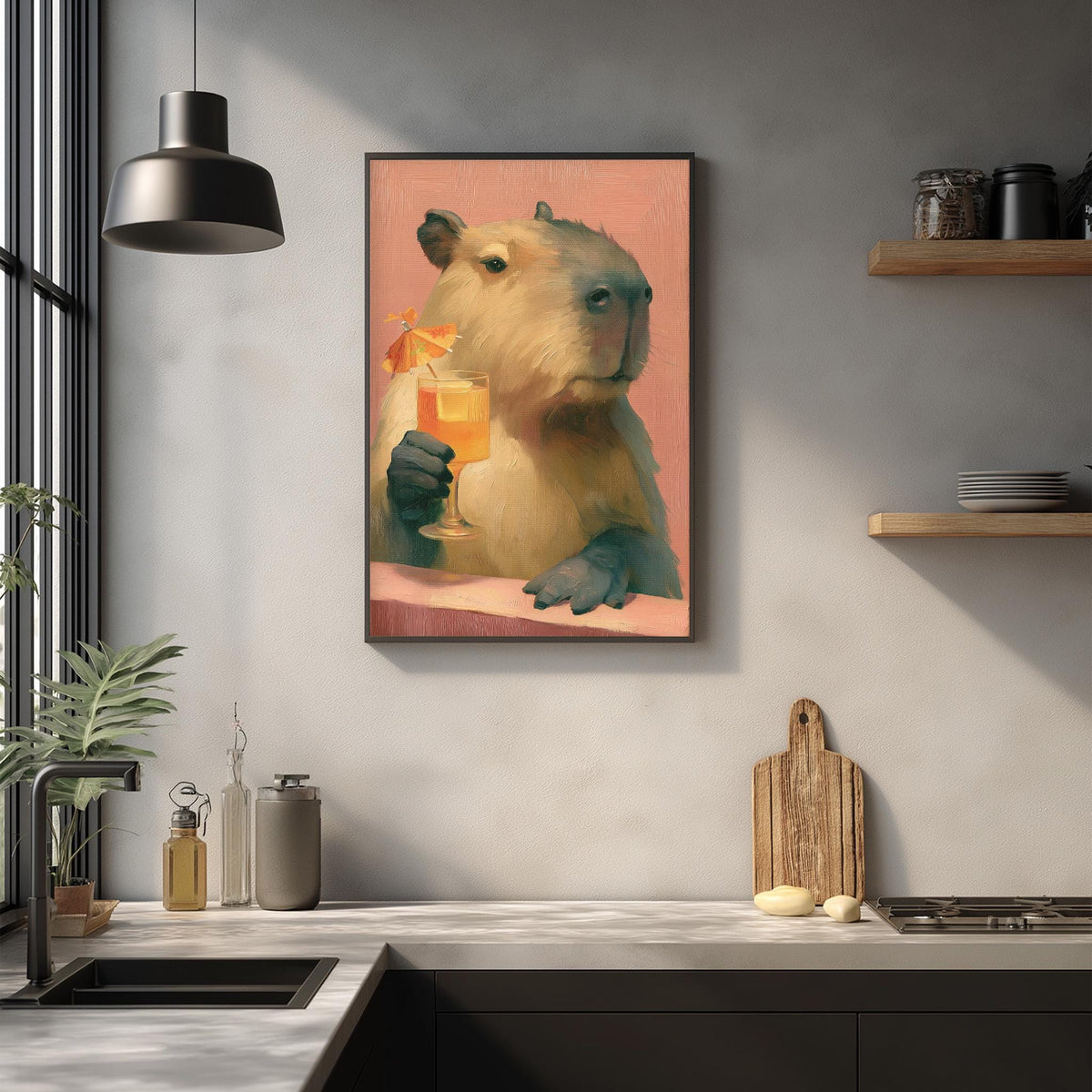a kitchen scene with a framed painting of a capybara holding a drink, a wooden cutting board, and various kitchen items such as a sink, a bottle, and a vase.
