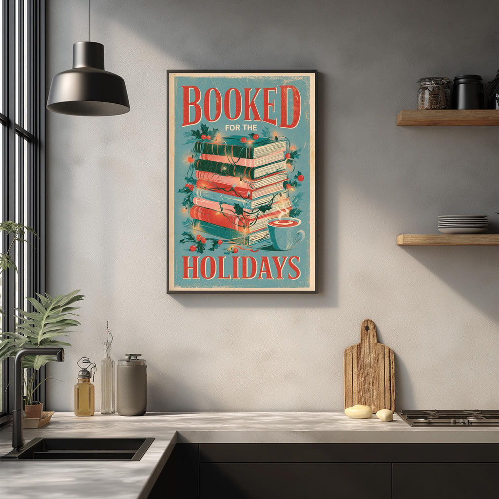 a kitchen counter with a framed poster that reads "BOOKED FOR THE HOLIDAYS" above it. The poster has a stack of books and other holiday-themed items on the counter.