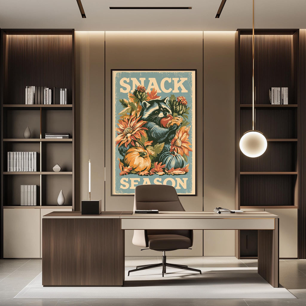 a modern office space with a large framed poster of a raccoon and flowers on the wall, a wooden desk with a chair, and a bookshelf filled with books.