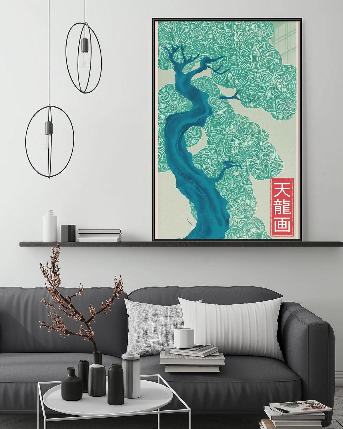 a modern living room with a gray sofa, a coffee table, and a large framed artwork depicting a tree with a blue trunk and green leaves. The artwork is hanging on the wall above the sofa, creating a focal point in the room.