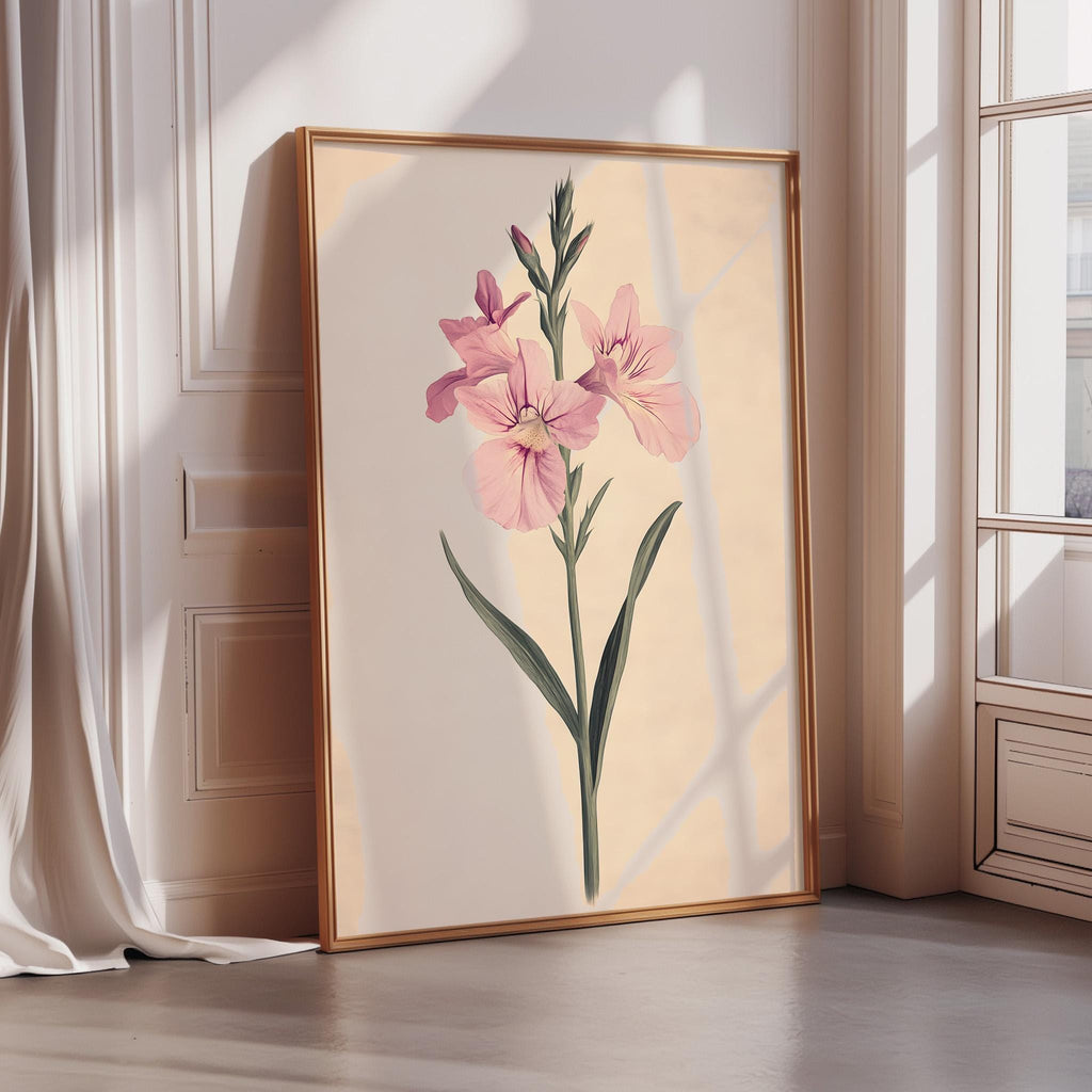 A framed illustration of a pink flower is displayed on a wall in a room with sunlight streaming in from a window.