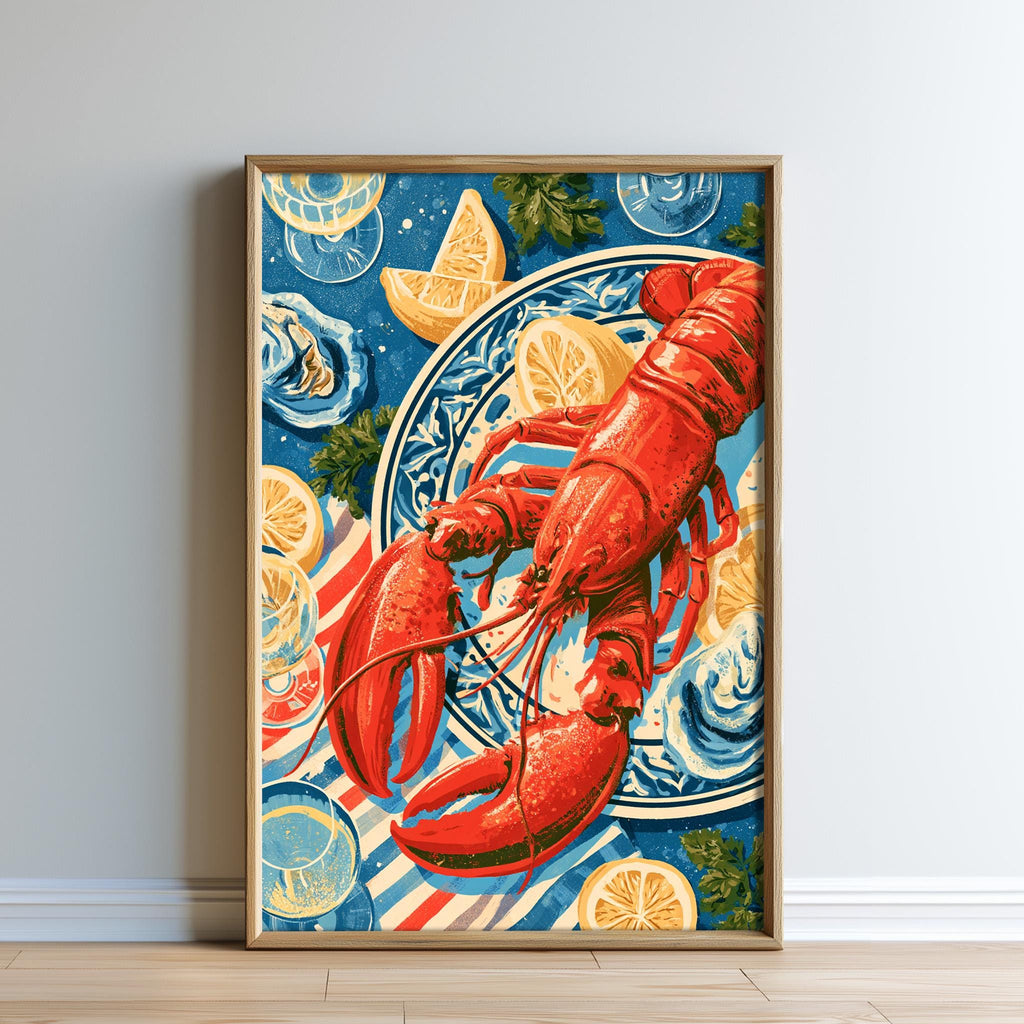 A framed illustration of a lobster on a blue and white plate, surrounded by various seafood items such as lemon slices and other seafood.