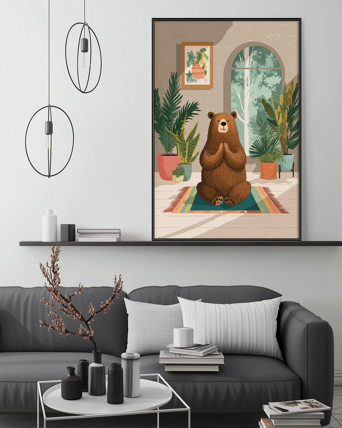 a cozy living room with a gray couch, a coffee table, and a large framed illustration of a bear sitting in a room with plants and a window.