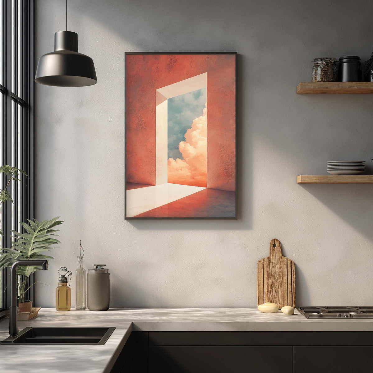 a kitchen counter with a framed artwork depicting an open doorway leading to a cloudy sky, creating a serene and dreamy atmosphere.