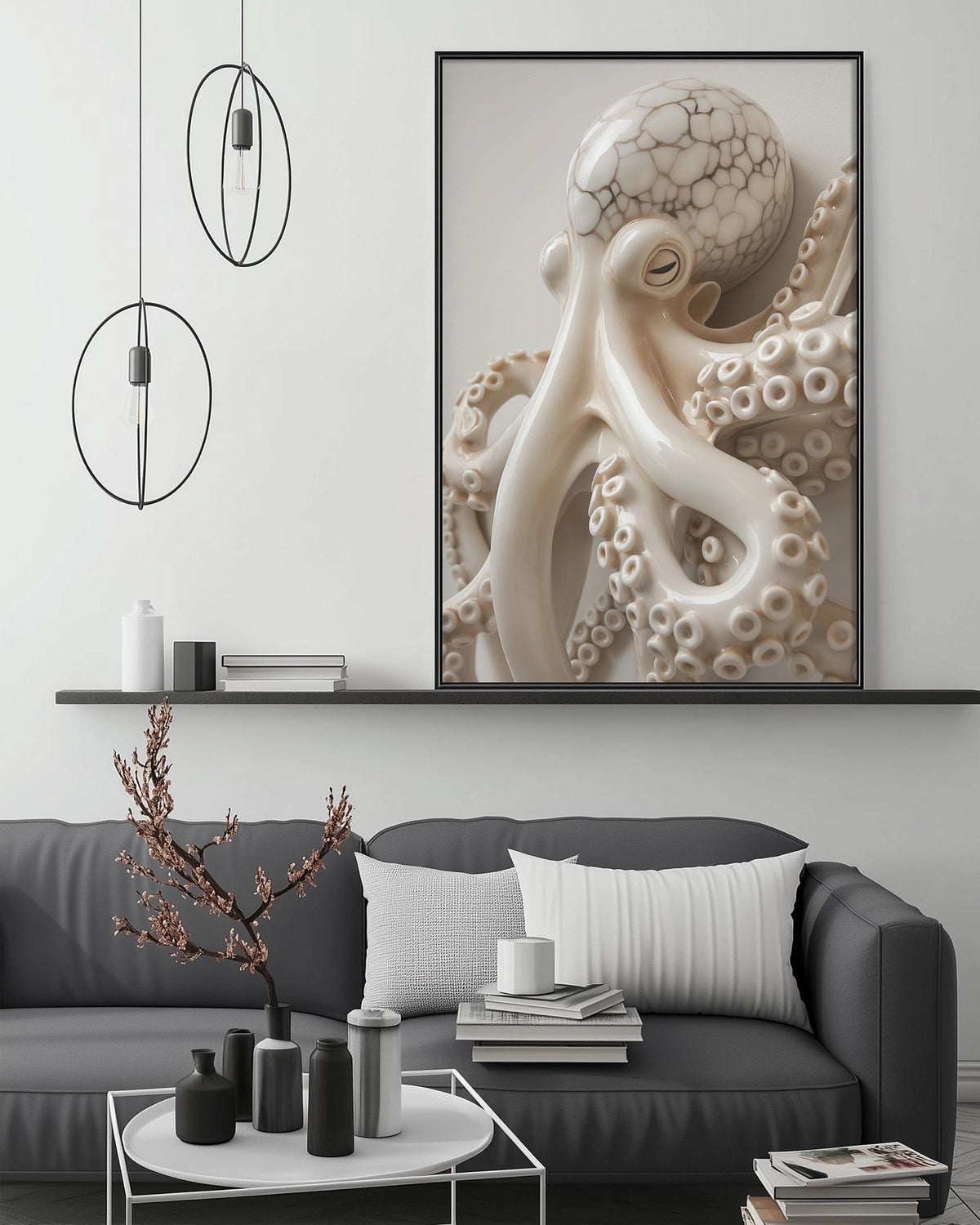 a modern living room with a gray sofa, a coffee table, and a large framed picture of an octopus on the wall above the sofa.