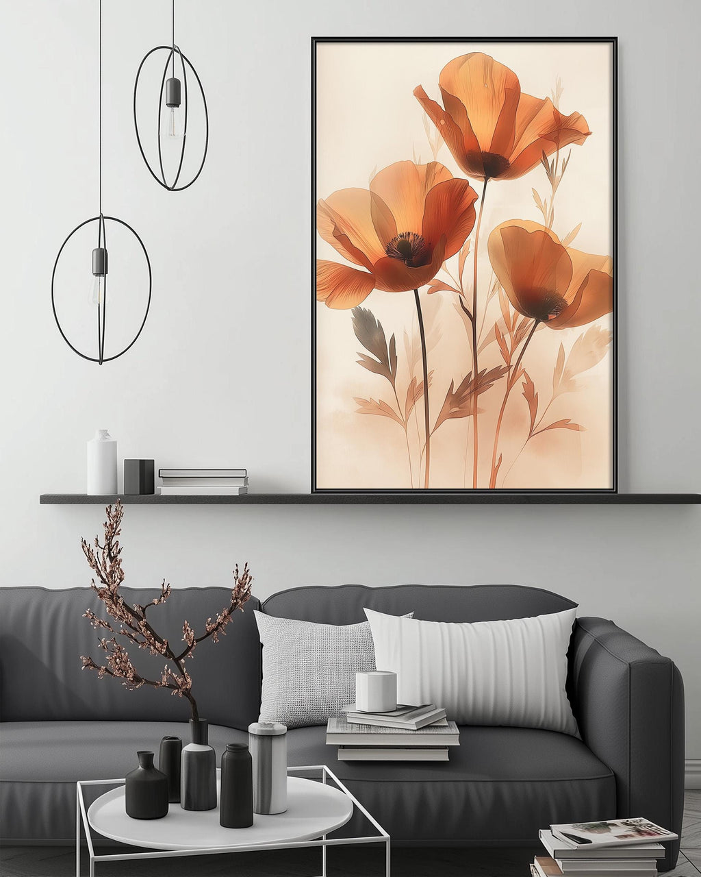 a modern living room with a gray sofa, a coffee table, and a large framed artwork of orange flowers hanging on the wall above the sofa.