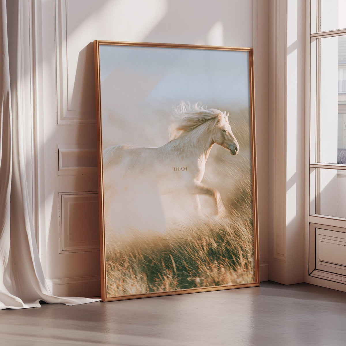 A large framed picture of a white horse running through a field of tall grass, with the word "ROAM" visible on the bottom right corner of the frame.