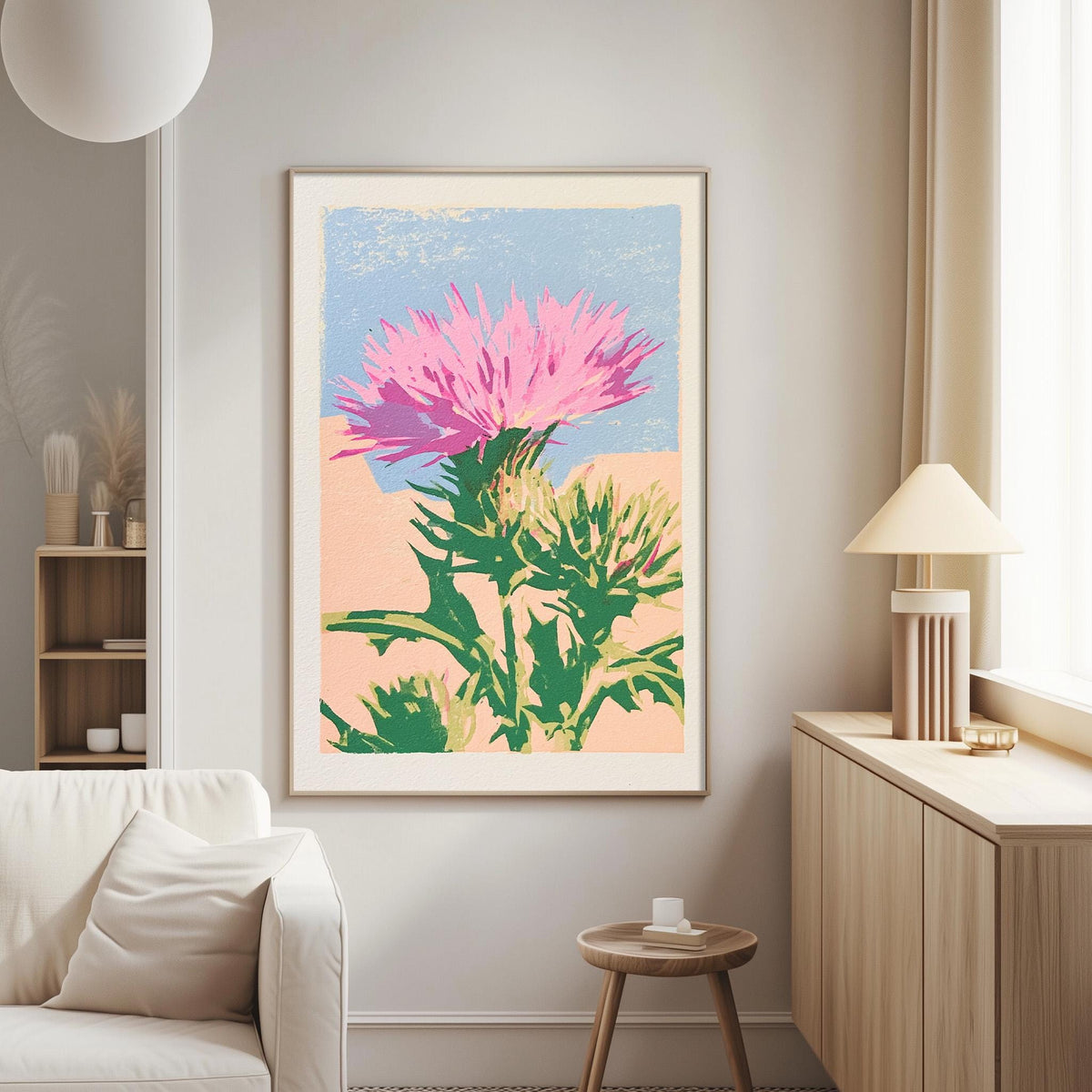 a large, colorful painting of a flower hanging on a wall in a living room.