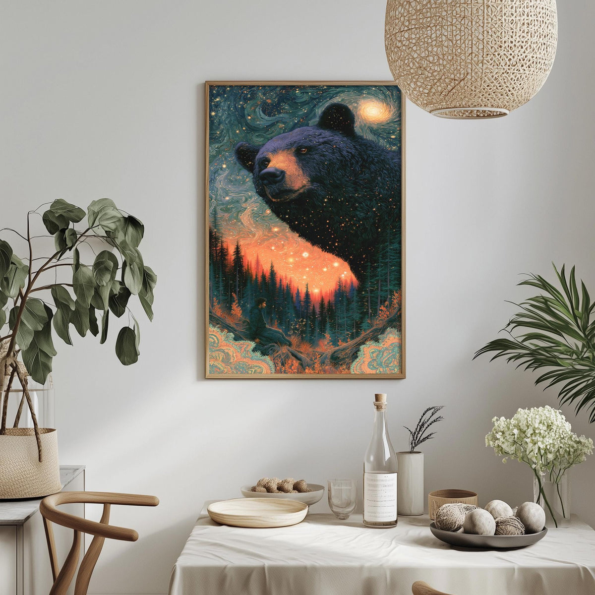 a large framed painting of a bear in a forest setting, hanging on a wall above a dining table with various decorative items and plants.