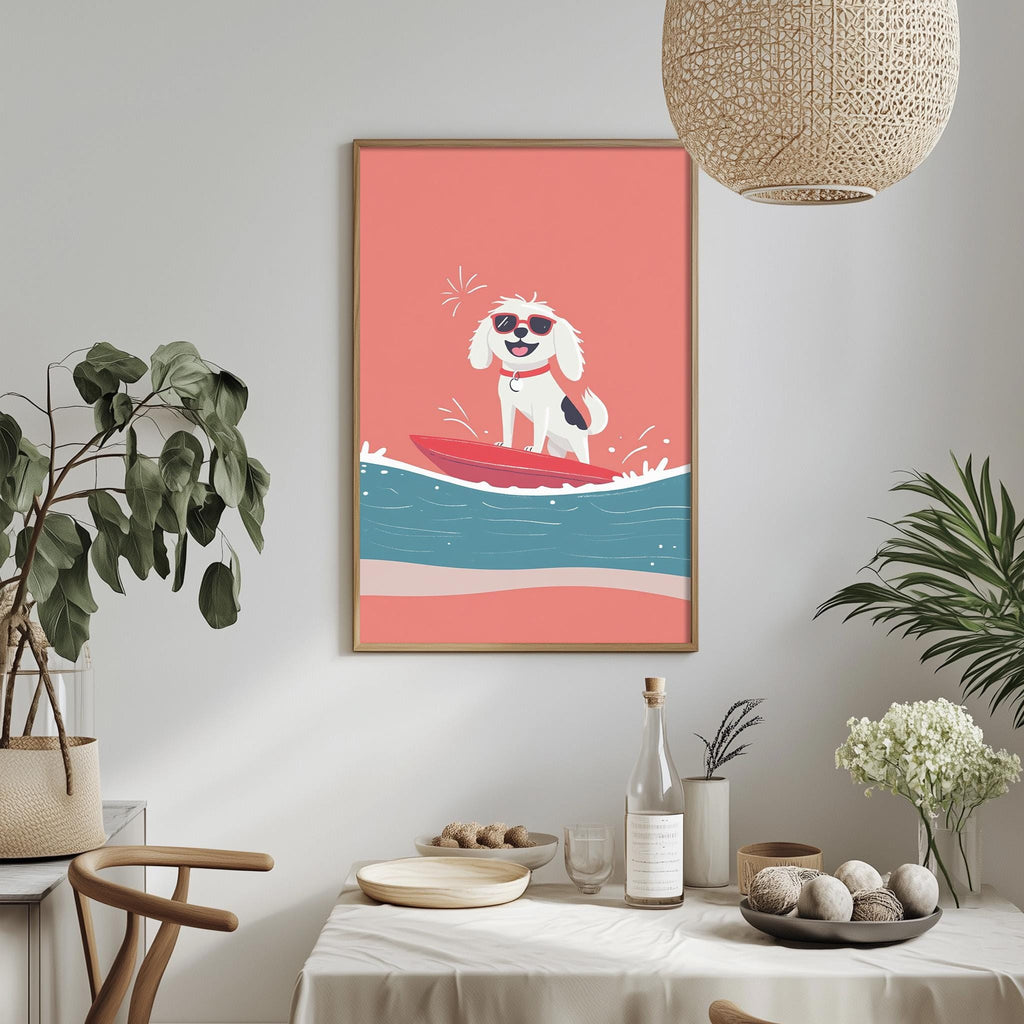 a framed illustration of a dog surfing on a red surfboard, with a pink and blue background. The dog is wearing sunglasses and appears to be enjoying the ride. The image is hung on a wall above a dining table, which has various items on it, including a bottle, a bowl, and a vase.