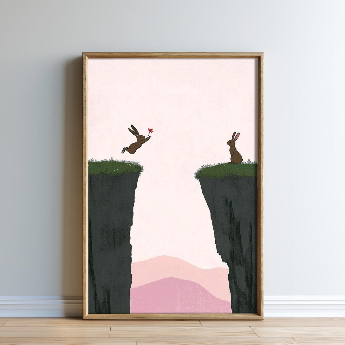 two brown rabbits jumping off a cliff into a grassy field, with mountains in the background.
