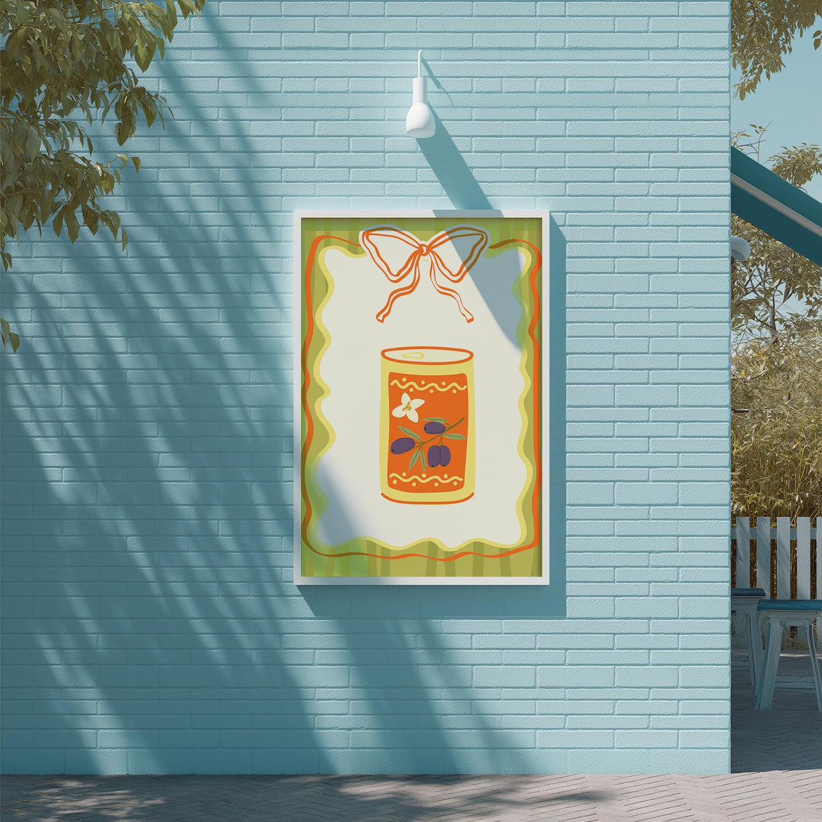 a blue brick wall with a framed poster of a can of food, including a bow, hanging on it.