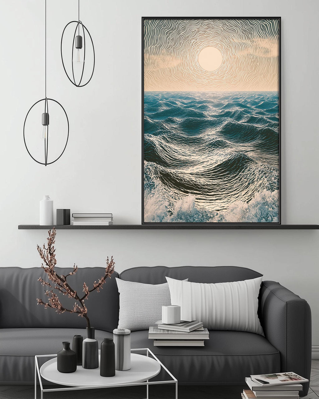 a modern living room with a gray sofa, a coffee table, and a large framed picture of a seascape hanging on the wall above the sofa.