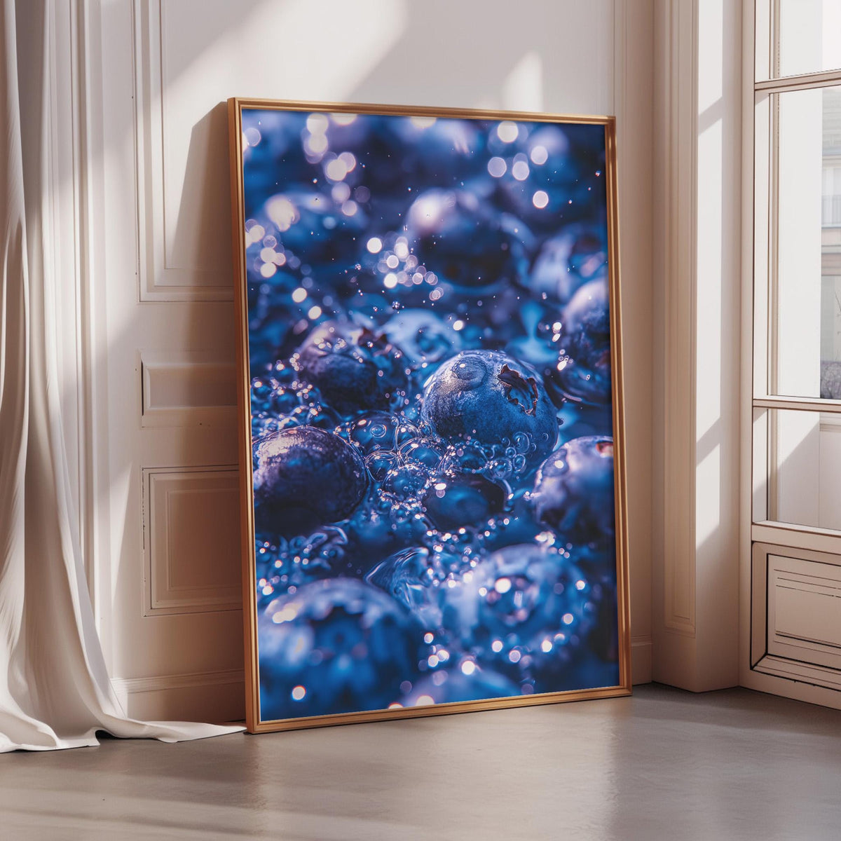 A framed photograph of blueberries is displayed on a wall, with the blueberries appearing to be in a liquid state, creating a visually striking and artistic composition.