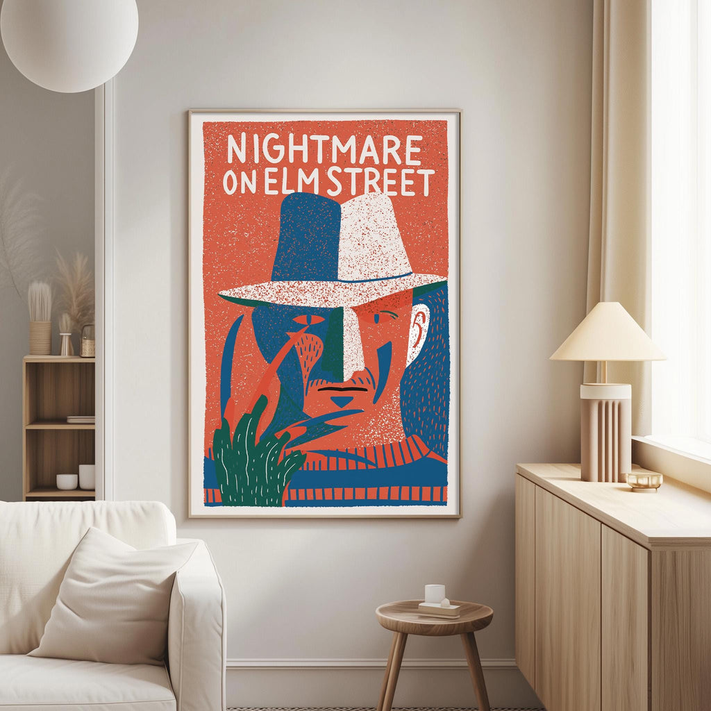 a poster of a man's face with a red and blue background, wearing a hat, and the text "NIGHTMARE ON ELM STREET" prominently displayed.