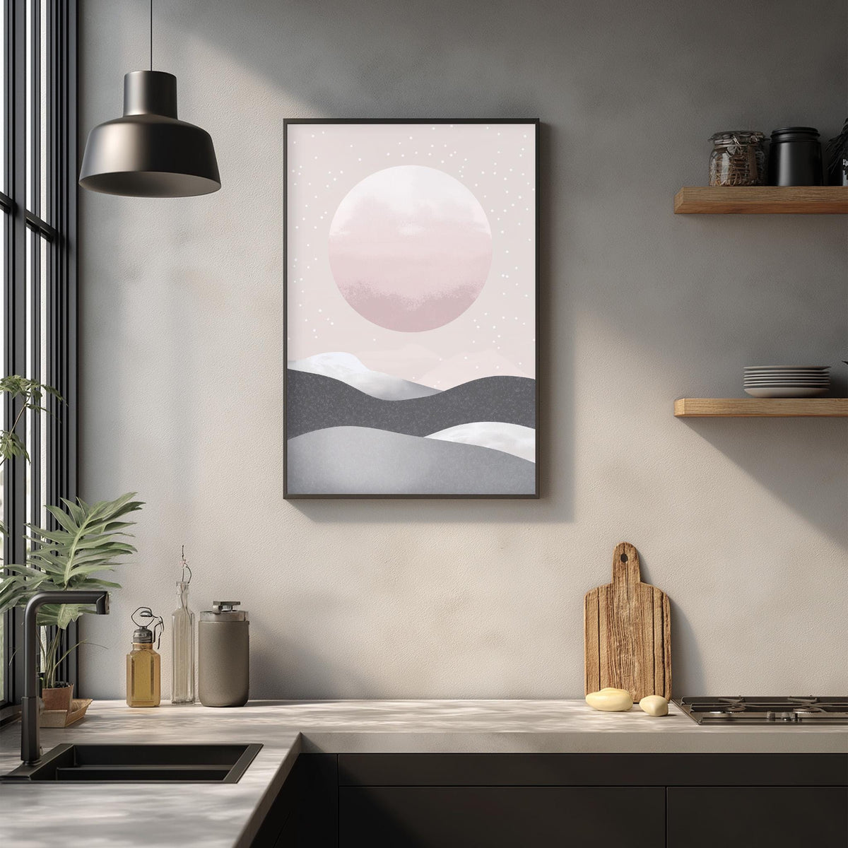 a kitchen counter with a framed landscape painting hanging above it, a wooden cutting board, and various kitchen items such as a bottle, a vase, and a bowl.