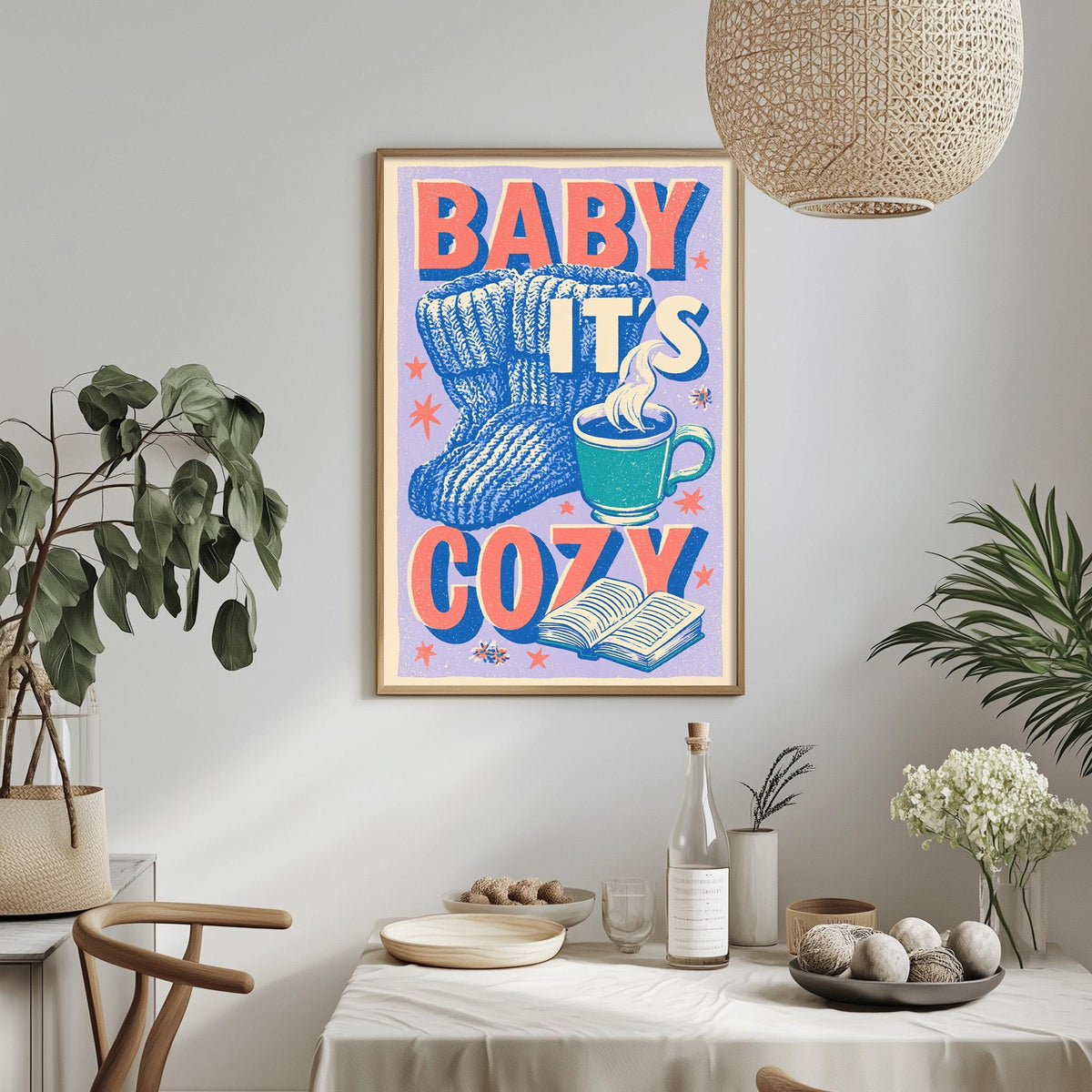 a cozy-themed poster hanging on a wall, with a dining table and chairs in the foreground.
