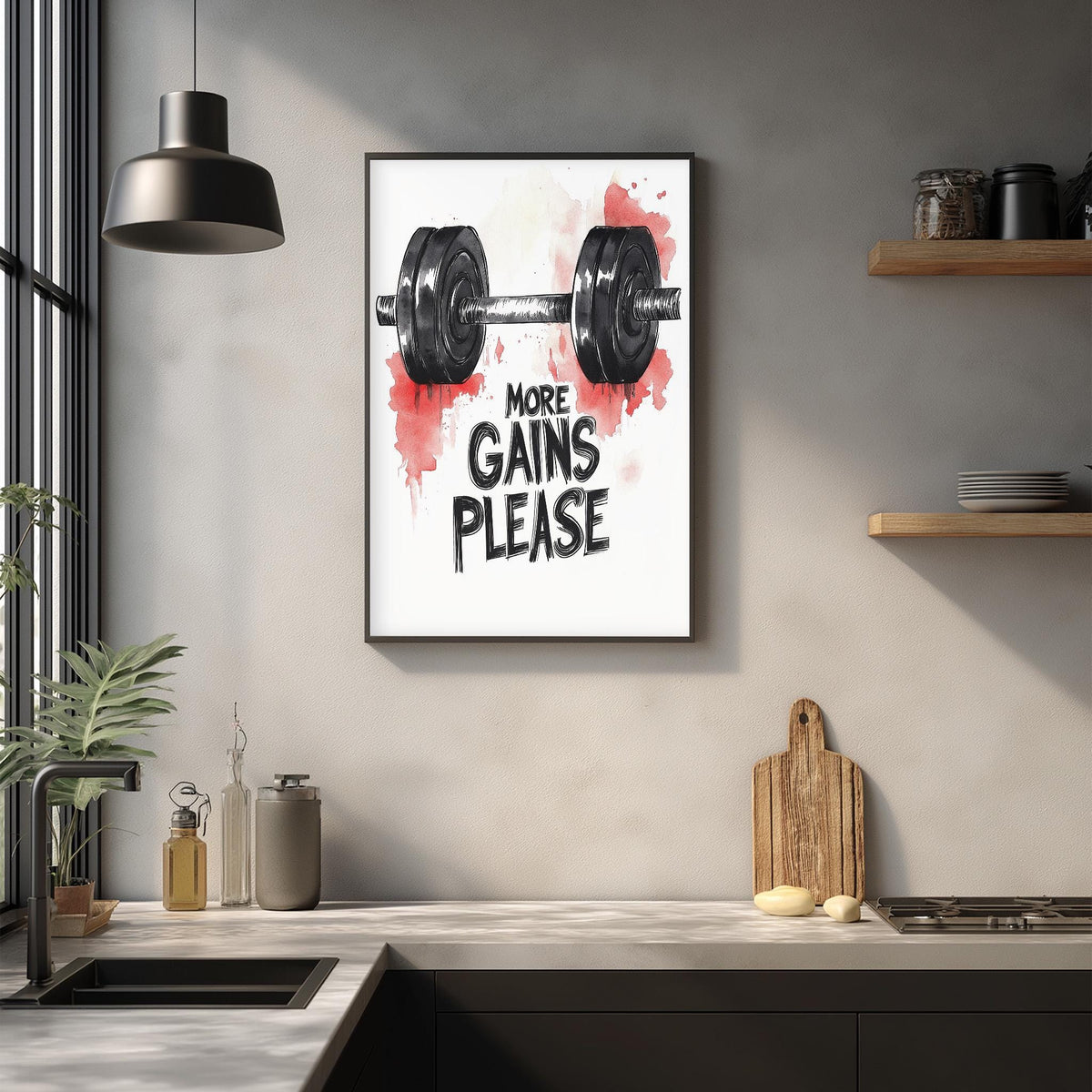 a kitchen counter with a framed poster that says "MORE GAINS PLEASE" above a weightbell graphic.