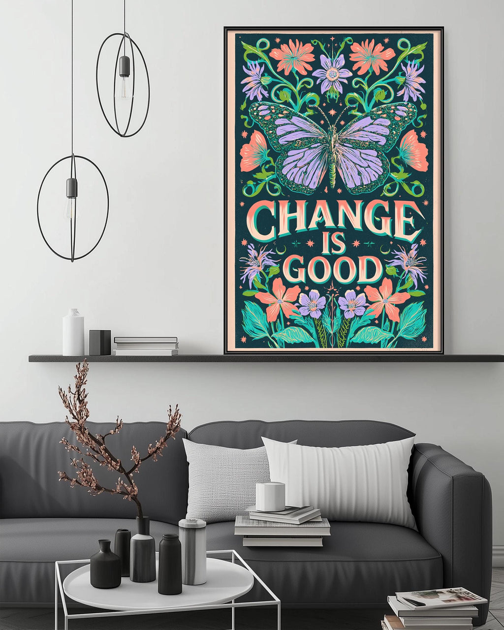 a large, colorful poster with the text "CHANGE IS GOOD" displayed on a wall above a gray couch. The poster is surrounded by various flowers and butterflies, creating a vibrant and lively atmosphere. The room has a minimalist and modern design, with a white coffee table, a potted plant, and a bookshelf in the background.