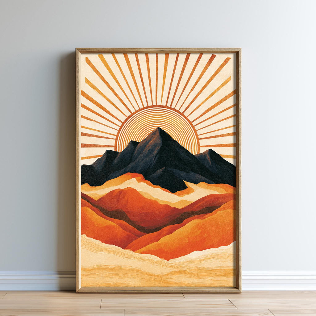 The image is a framed artwork depicting a mountain landscape with a sunburst design in the background.