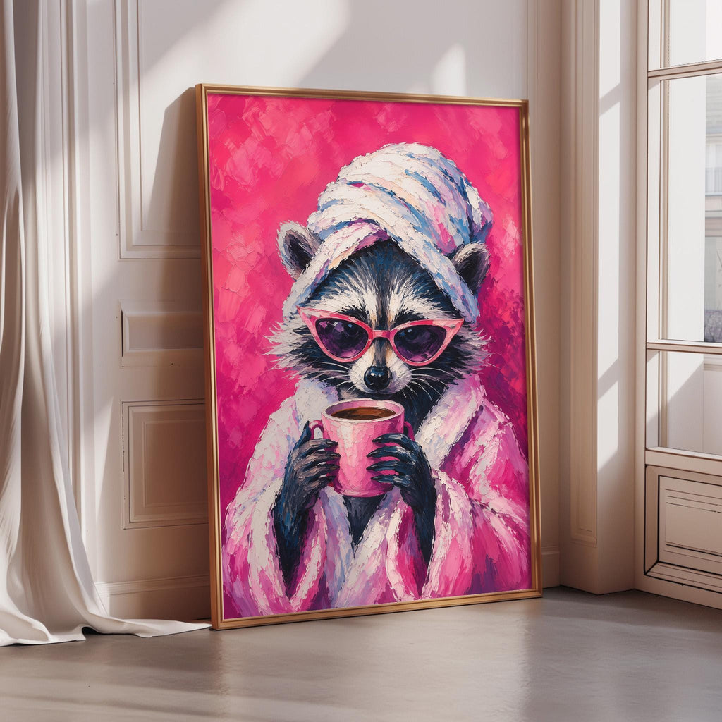 A raccoon wearing a pink robe and sunglasses is holding a cup of coffee, set against a vibrant pink background.
