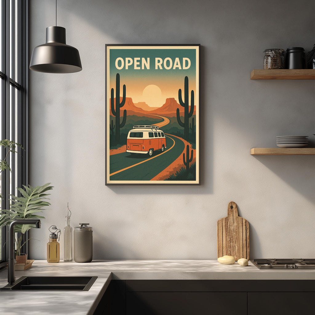 a framed poster of a van driving on a road through a desert landscape, with the text "OPEN ROAD" prominently displayed.