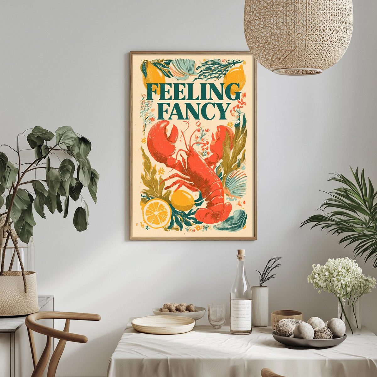 a framed poster with a vibrant illustration of a lobster, surrounded by tropical plants and a lemon, hanging on a wall above a dining table with various decorative items.